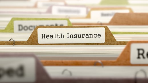 Health Insurance - Folder Register Name in Directory. Colored, Blurred Image. Closeup View.-1